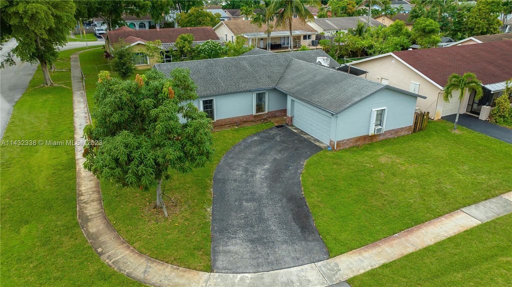 Photo of 10900 NW 28th St, Sunrise, FL 33322 (MLS # A11432338)