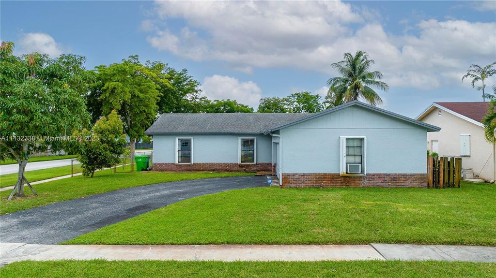 Photo of 10900 NW 28th St, Sunrise, FL 33322 (MLS # A11432338)