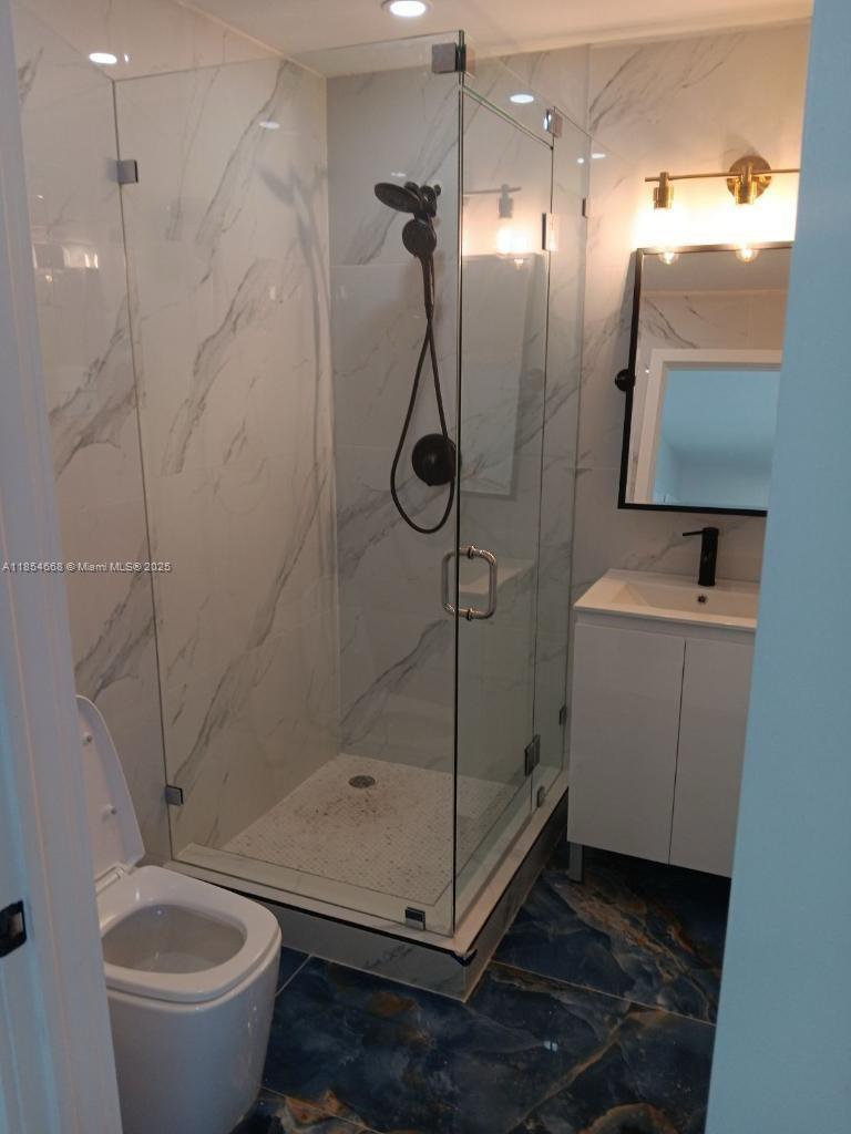 Discover this fully furnished and equipped apartment, ready for you to move in. Located at Mile Marker 98 in Tavernier, this unit offers an unbeatable location with direct exposure on the Overseas Highway. The building recently underwent over $100,000 in furnitures, including brand-new appliances and top on the line equipment in each unit. The building is a hub of activity, with popular businesses like a hair and nail salon, a pizzeria, and a doctor's office. A food truck and ice cream shop are also coming soon, attracting plenty of foot and car traffic.