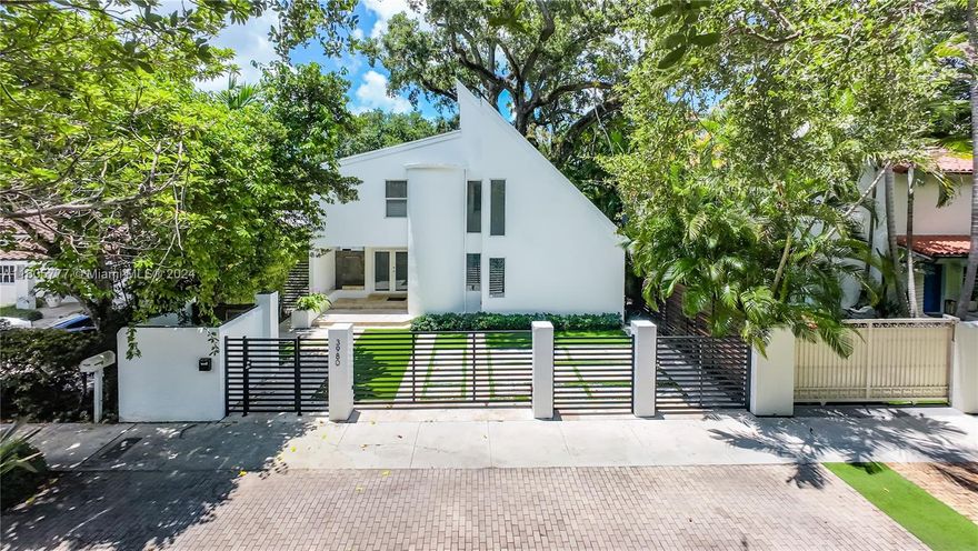 Experience bright, sun-filled living in this ready-to-move-in South Grove home, freshly repainted inside and out. It features a gourmet kitchen with high-end quartz/granite countertops and expansive living spaces. Enjoy the private sun deck accessible from the primary bedroom and relax by the lush tropical pool. The home has high ceilings and large windows, filling each room with natural light. Recent updates include a new roof, septic system, bathrooms, and gated entry. Just a 6-minute walk to Carver Middle School and close to renowned private schools, this property is in one of Miami’s most desirable neighborhoods, offering a tranquil retreat with urban convenience.