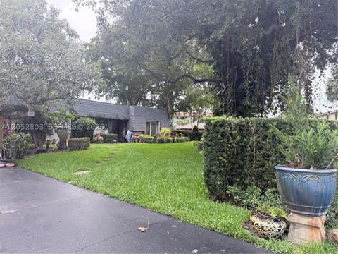 Photo of 8541 N Lake Dasha Dr, Plantation, FL 33324 (MLS # A12052803)