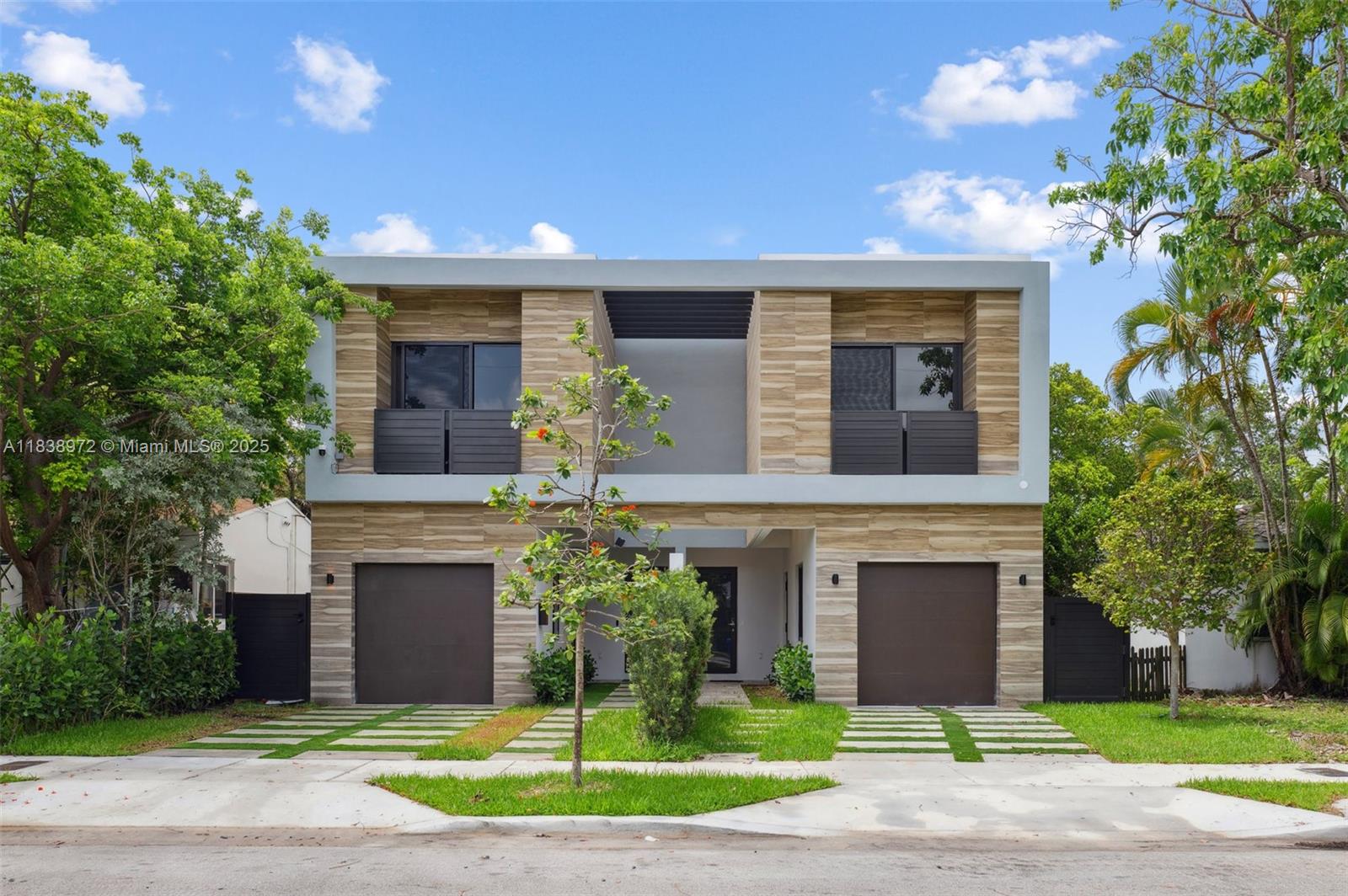 New Construction. Nestled in The Roads, this new urban villa offers the perfect balance of location, luxury, and
space. The interiors (2,850 SF/ under AC) feature living and dining room with volume ceilings, imported custom
kitchens and bathrooms, premium Thermador appliances & gas cooktop. There is One (1) bedroom on the first
level and 3 bedrooms on the 2nd level for a total of 4 bedrooms and 3 baths + balconies, the kitchen and family
room have floor to ceiling sliding doors that open to a private deck & garden with a spa-pool. There is also one
attached garage, a driveway and ample street parking. Walking distance to Brickell, The Metrorail, The Underline,
Walgreens, Publix, restaurants, banks, and entertainment. Move in today!