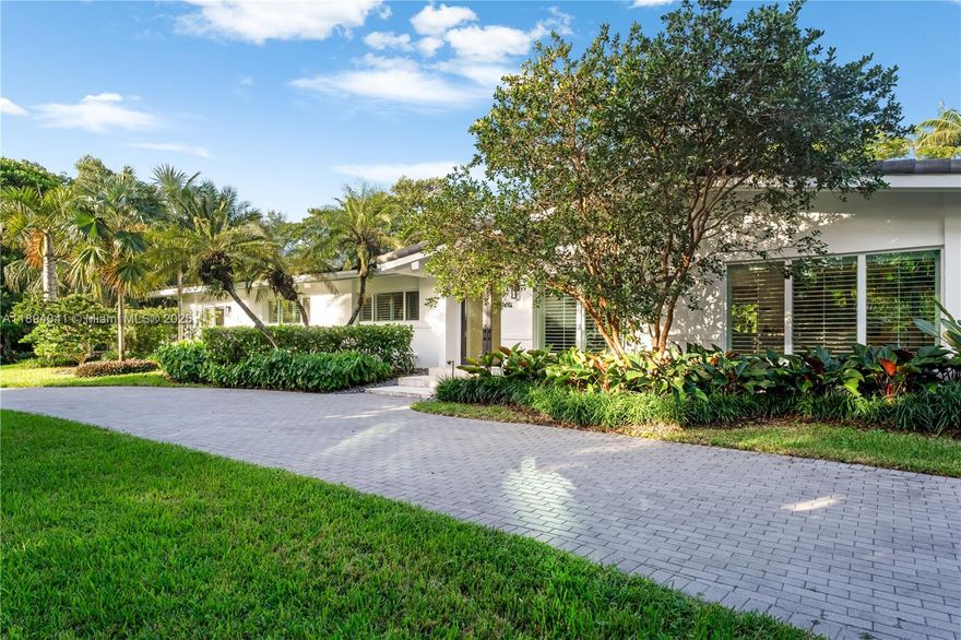 Welcome to this charming and elegant home nestled on a builder’s acre in one of Pinecrest’s most desirable neighborhoods. This private retreat features meticulously landscaped grounds that create a peaceful, natural setting. And all this minutes away from the best Private and Public schools, walking trails, and public parks.
Inside the house offers bright and inviting spaces that are enhanced by updated wood floors and travertine accents, lending both warmth and style. 
The outdoor area is designed for entertaining, with a newly installed natural stone pool deck surrounding the pool, perfect for enjoying Miami’s sunny days. Ideally located near top-rated schools, this property offers the best of Pinecrest living—a harmonious blend of privacy, sophistication, and convenience.