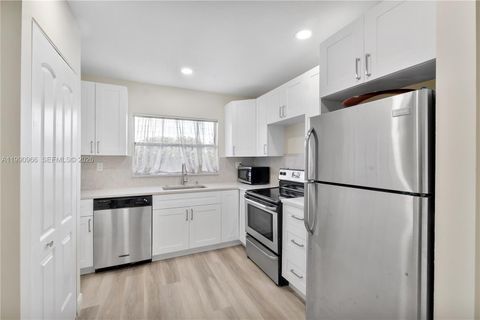 Photo of 9201 Sunrise Lakes Blvd #304, Sunrise, FL 33322 (MLS # A11990966)