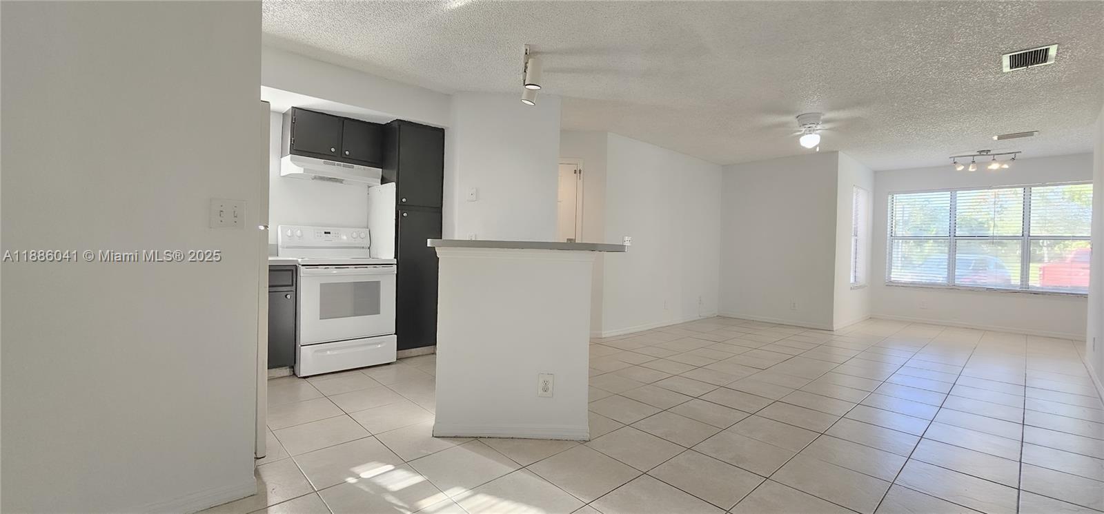 FOR INVESTORS OR LIVE.
INVESTOR'S DREAM! Come see this rare opportunity to own a spacious 2-bedroom + Den, 1 bathroom unit on the 1st floor in the Community of Coral Key.
Tenant inside paying $1,800 /month.
Great Investment property, Resort Style Living in Condo, Beautiful 2 Beds 1 Full Bath and Den unit, updated kitchen with tile flooring throughout. Spacious bedrooms, walk-in closet in master. Unit has full-size washer and dryer. Centrally located, just minutes from Sawgrass Mills Mall, BB&T Center, dining and major highways. A-Rated public schools! Community amenities include two pools, fitness center, tennis, racquetball, BBQ and picnic areas. Ok to lease first year. No lease shorter than 6 months. Investor friendly. 1 dog and 1 cat permitted not over 25 lbs. Use showing time.