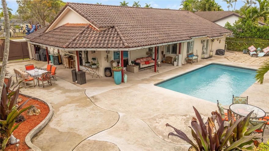 Located in the heart of Calusa Estates, this is a rare chance to secure a home directly across from the 10/10 Rated STEM Calusa Elementary & Park. With property values in the area skyrocketing past $1M and no HOA, this is the ultimate family-living at its best - way under 1M.  Beautiful house re-built to last - literally!. Gutted and structurally reinforced with new rebars, elevated floors to one level in 2008, it features full hurricane impact windows, doors, and still under warranty barrel tile roof for maximum peace of mind. Inside, the space is wide open and flooded with natural light, featuring seamless tiling and a generous entertainer’s kitchen with 5-year-new Frigidaire Professional series side by side stainless steel refrigerator and dishwasher.  The primary suite is a true retreat, boasting a versatile 6.5' x 8.5’ adjacent room perfect for a nursery or high-end home office. 
Step outside into your private backyard oasis: a covered terrace leads to a sparkling 15' x 30' pool with a 2023 pump and full sprinkler system. Whether you're hosting a poolside BBQ or walking the kids across the street to one of Miami's best schools, this home delivers the lifestyle you've been searching for. Calusa Estates is the crown jewel of Eastern Kendall: where value, demand, location, and family lifestyle successfully converge. Don't let this one get away, easy to show 24 hours notice required