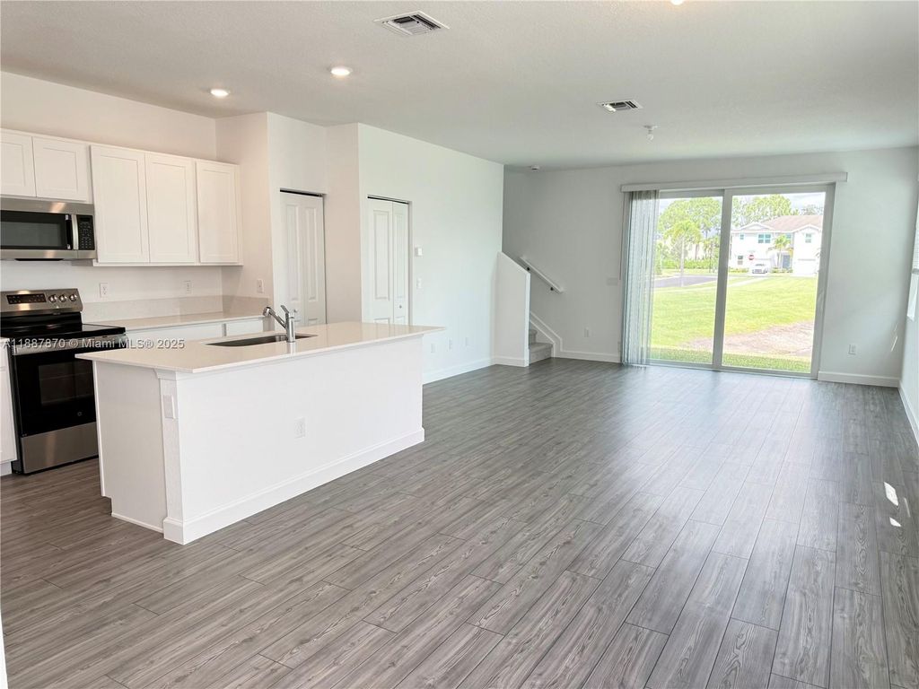 Photo of 551 SE Rivergrass St #551, Port St Lucie, FL 34984 (MLS # A11887870)