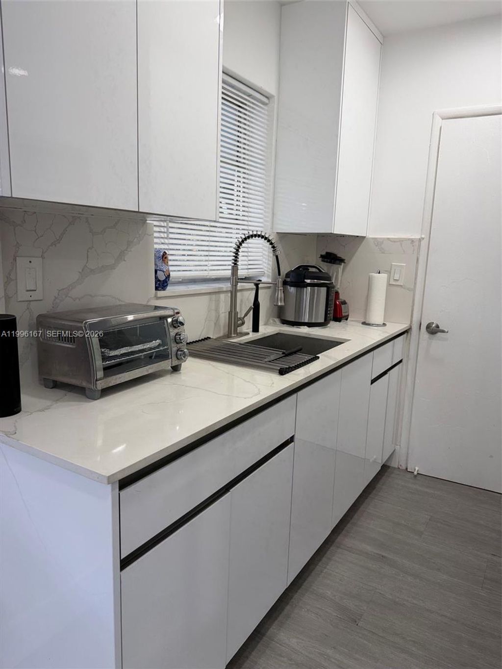 Photo of 821 NE 6th St #2, Hallandale Beach, FL 33009 (MLS # A11996167)
