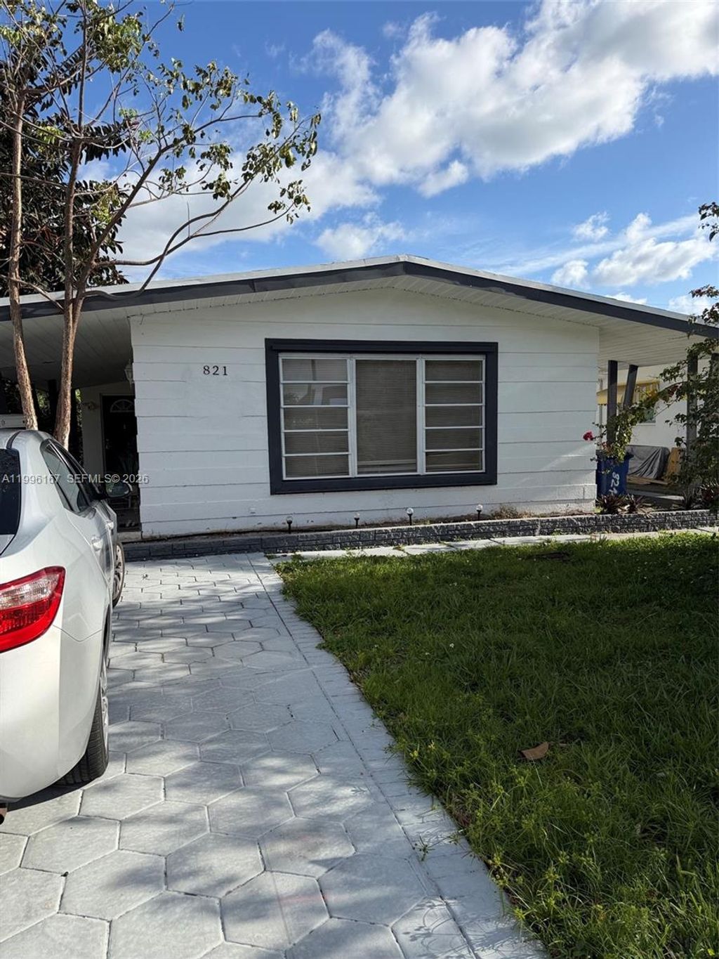 Photo of 821 NE 6th St #2, Hallandale Beach, FL 33009 (MLS # A11996167)