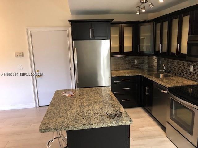 LAKES OF JACARANDA CONDO - Residential Lease