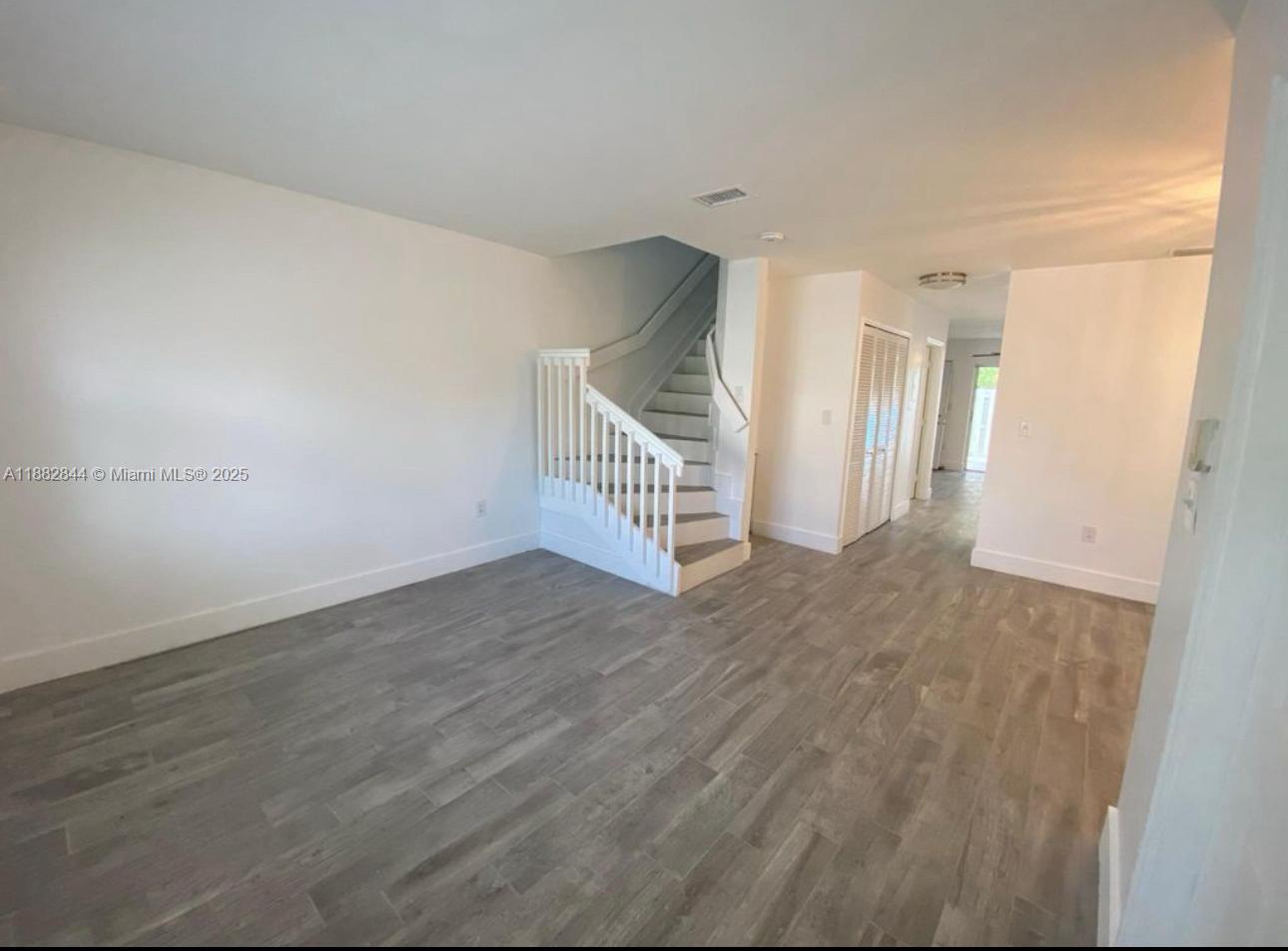 ADRIAN HOMES AT THE WOODL - Residential Lease