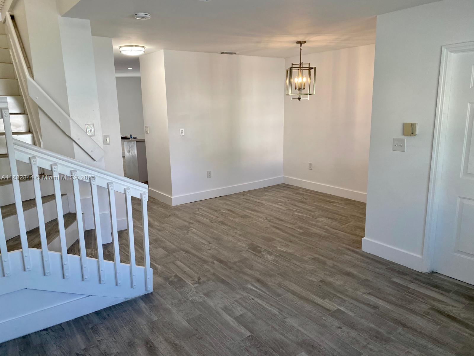 ADRIAN HOMES AT THE WOODL - Residential Lease