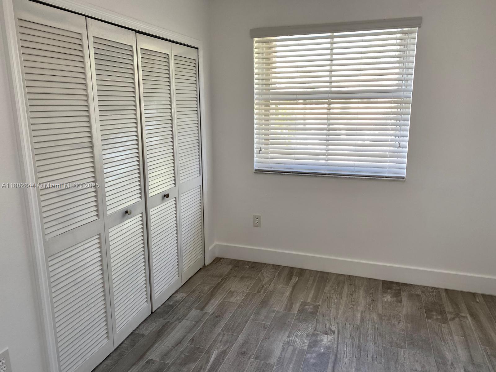ADRIAN HOMES AT THE WOODL - Residential Lease