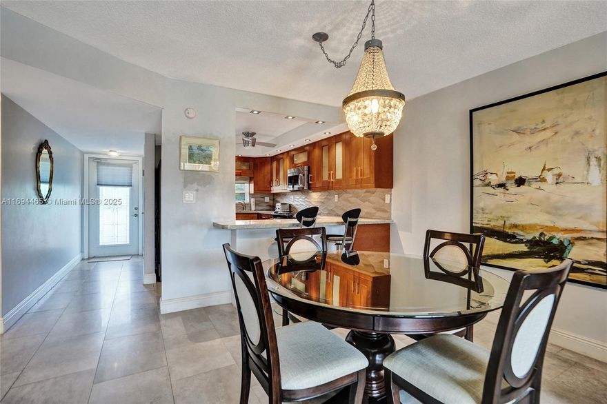 Welcome to your dream condo in the heart of Pembroke Pines/HollyBrook a 55+ community! This stunning 2-bedroom, 2-bathroom will make you feel right at home. With granite counters and stainless steel appliances in the kitchen. The tile flooring throughout the condo adds a touch of elegance, and the walk-in closets provide ample storage space. Enjoy the Florida sunshine on your screen patio, which features impact doors and windows for added safety and security. Check out the on-site restaurant and the GPA golf course. Enjoy free golf (additional charge for golf cart if needed). New AC and hot water tank. Rec fees paid in full for this unit. HOA dues are paid quarterly and includes water, basic cable, and internet.This unit is currently leased until May 08, 2025. Investors welcome.