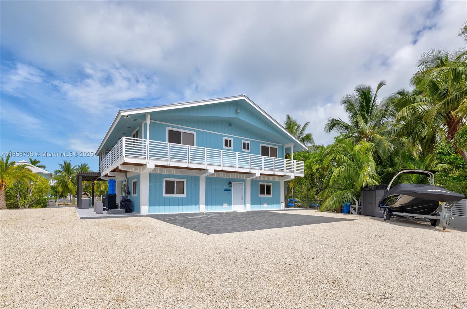 Situated on a 12,600 sq. ft. lot in Buccaneer Point Estates, this updated waterfront residence blends privacy, quality, and direct bay access. On a protected basin with an 80 ft. dock, 12,000 lb. lift, and quick access to bay and ocean via Tavernier Creek or Adams Cut, it’s ideal for boating, fishing, and watersports. The 3-bed, 2.5-bath home offers a new standing seam metal roof, wraparound balcony, 157 ft. concrete fence with electric gate, and a resort-style ground level with pool, jacuzzi, pergola, and outdoor kitchen. Indoors features a bright layout, custom cabinetry, quartz counters, Bespoke appliances, walk-in closets with built-ins, porcelain floors, and marble baths, plus tiled terrace and stairs for seamless indoor-outdoor living. Schedule your private showing today!