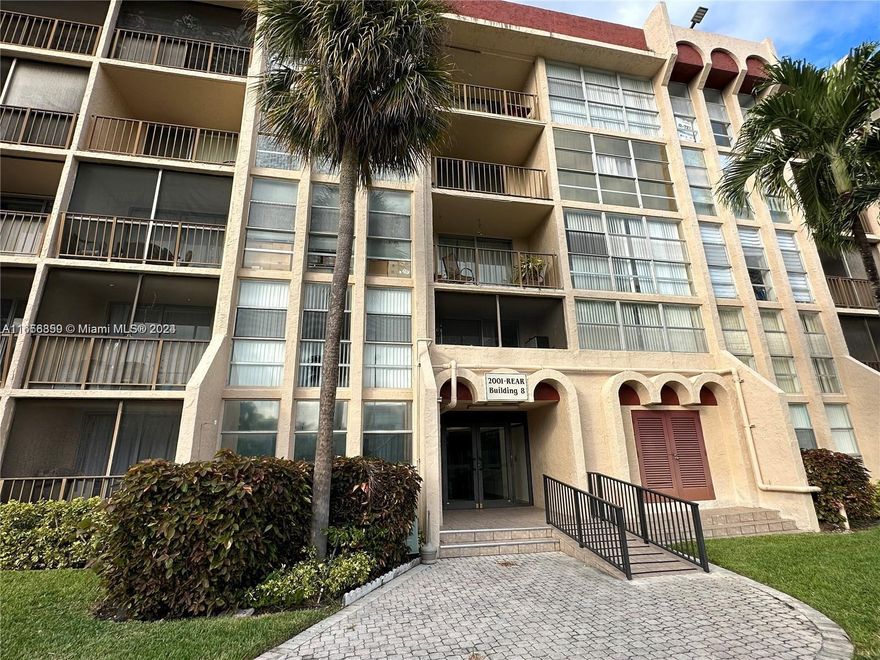 Corner unit, 1450 SQ.FT. Split Floor Plan, 2BD 2BA with 2 balconies. Very large living room with den area, floor to ceiling windows provide natural lighting. Lots of storage spaces, closets and walk in closets.  Located next to Joseph Scavo Park with its playground, fitness trail, and dog parks.  AMENITIES INCLUDE 2 TENNIS COURTS, POOL. 10 MIN FROM THE BEACH, PARK, RESTAURANTS, SHOPS. Basic cable, water, internet, pest control, lawn care, and security cameras ARE INCLUDED IN MONTHLY FEES. CURRENT SPECCIAL ASSESSMENT WILL BE PAID OF BY THE SELLER.
 You’ll also find restaurants, Walmart, Starbucks, and several professional services nearby.