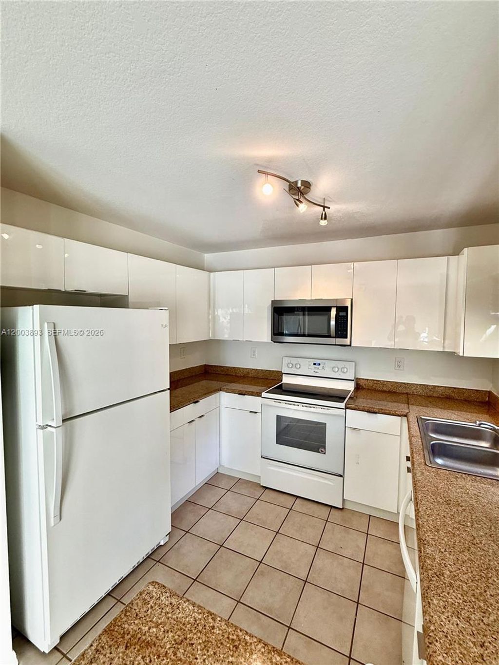 Photo of 2206 NW 170th Ave, Pembroke Pines, FL 33028 (MLS # A12003893)