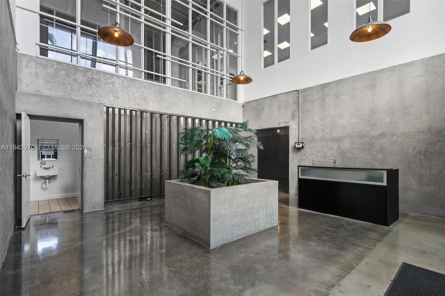 Fully air-conditioned office/warehouse totaling 7,247 SF, featuring a modern ±2,894 SF two-story office build-out constructed with shipping containers. The office includes a reception area, conference room, and glass walls overlooking the warehouse, creating a contemporary and functional workspace.

The warehouse offers 24-foot clear ceilings, energy-efficient LED lighting, and a rear double loading door with one recessed dock-high platform and a ramp, allowing for efficient loading operations. The property also benefits from abundant unassigned parking.

Strategically located at Palmetto Expressway and NW 25th Street, just one mile west of Miami International Airport’s cargo area, the versatile layout is ideal for a wide range of users, including fulfillment centers, media production companies, and growing startups.

The unit may be purchased individually or combined with the ADJACENT 6,110 SF warehouse totaling 13,357 SF, offered at $2,445,000. Located within Miami Airport Center, in the heart of Miami-Dade’s most active industrial market, the property offers exceptional flexibility and features designed to support long-term business growth.