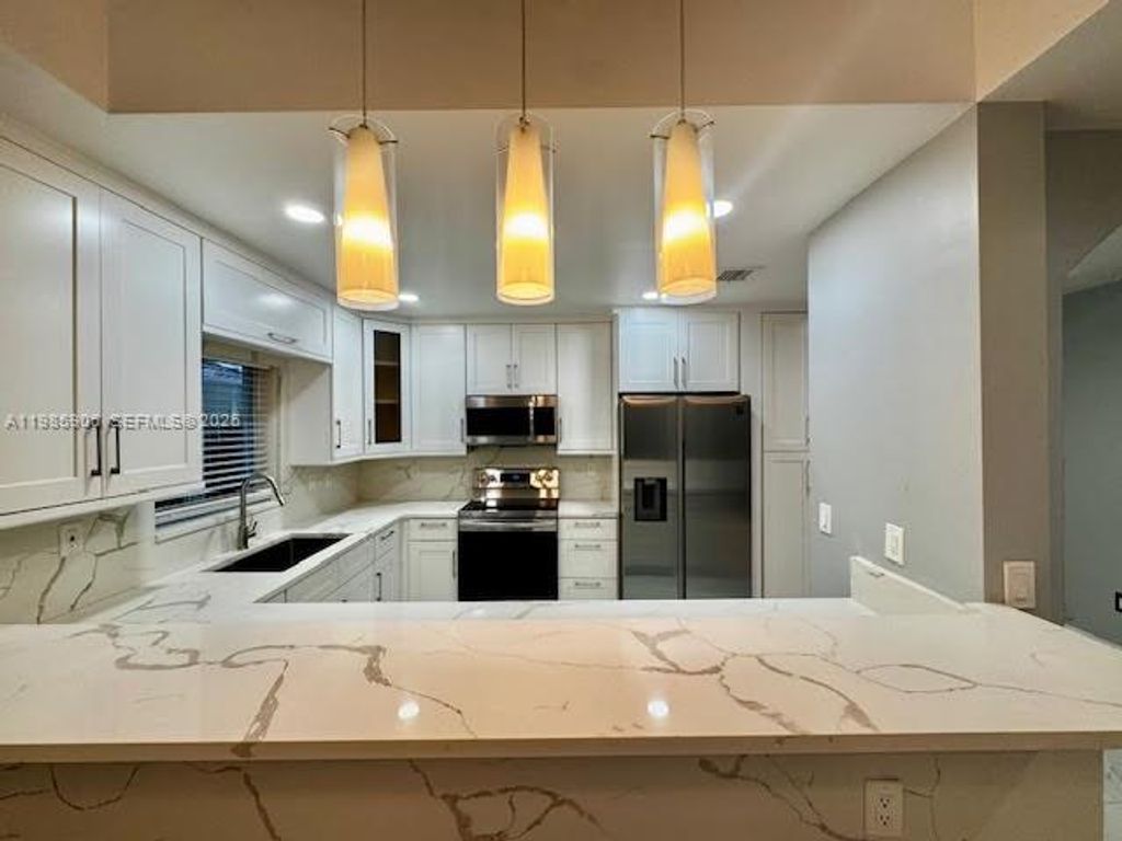 Photo of 2706 NE 30th Pl #2706, Fort Lauderdale, FL 33306 (MLS # A11985906)