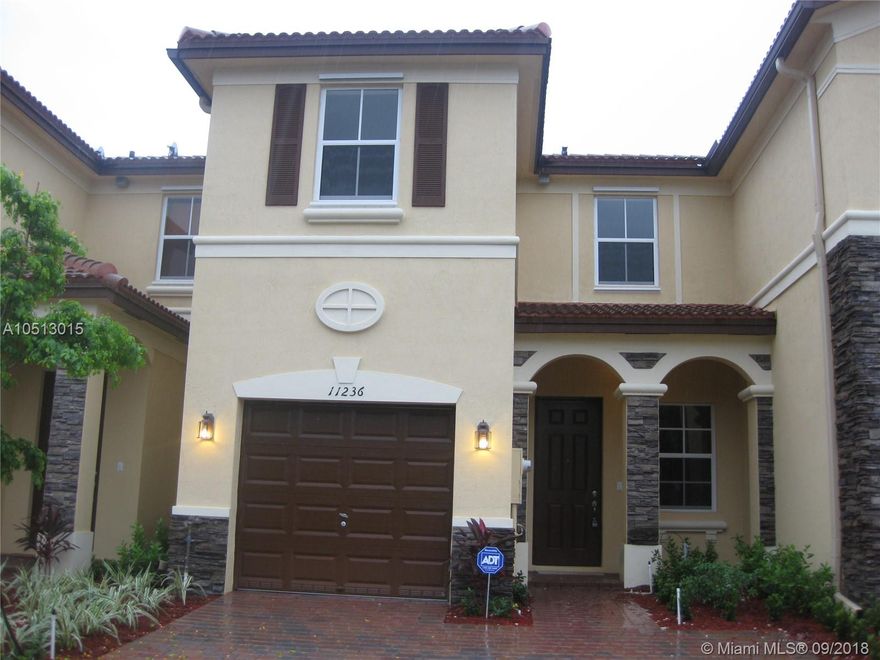 BEAUTIFULL COACH HOME, WITH 3 BEDROOM AND 2 AND HALF BATHROOM, FRESHLY PAINTED, VERY WELL MAINTAIN, PATIO COVERED WITH BRICK, ONE PARKING SPACE COVERED, MORE SPACE FOR PARKING ON FRONT, ACROSS THE STREET IS THE POOL FOR THE COMUNITY, WALKING DISTANCE TO LAGACY PARK, AND THE BEST SCHOOLS OF DORAL. VERY WELL LOCATED, CLOSE TO THE MAJOR HIGHWAY.... LAST TOWNHOMES FROM THE DEVELOPER DONE IT IN THE AREA....