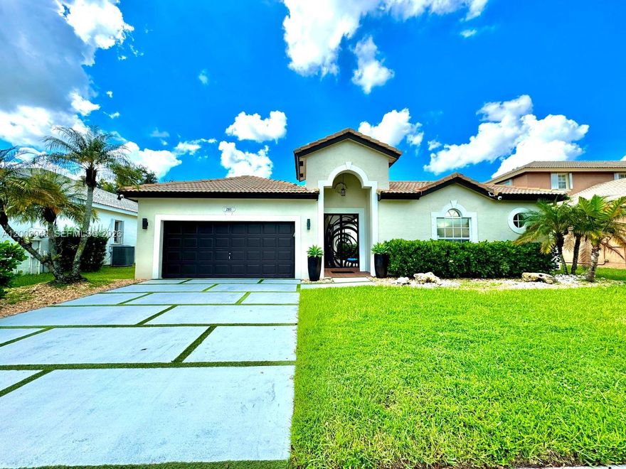 Bright, beautifully remodeled courtyard home in the prestigious gated community of Pembroke Shores. This 3-bedroom, 3-bath residence offers a private oasis with a lighted pool and a fully renovated guest/in-law suite—ideal for multigenerational living or added privacy. The home features a brand-new roof (2025), new pool pump, elegant marble floors in the kitchen and dining areas, and spacious living and family rooms filled with natural light. All three full bathrooms have been tastefully remodeled. Additional highlights include a dedicated laundry room, hurricane accordion shutters, impact glass French doors, and a finished garage with epoxy flooring, A/C, and an insulated garage door. Lawn and pool maintenance are included. Move-in ready and designed for comfort, functionality, and style. THIS PROPERTY WILL NOT LAST