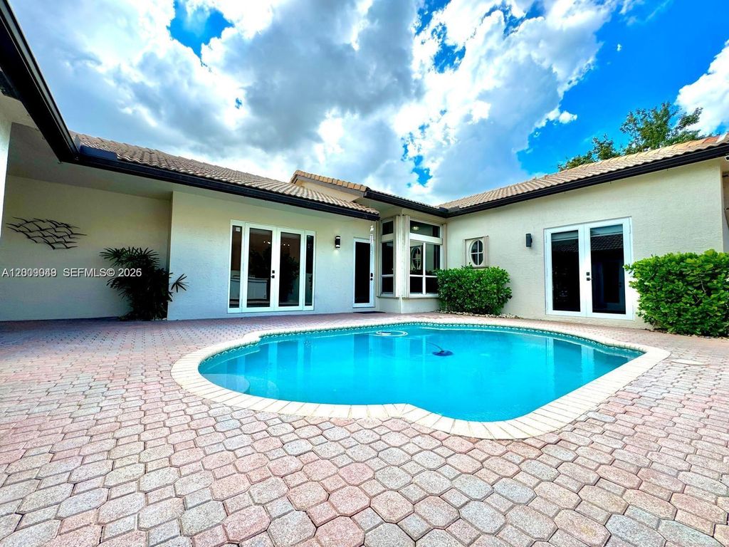 Photo of 280 SW 167th Ave, Pembroke Pines, FL 33027 (MLS # A12009049)