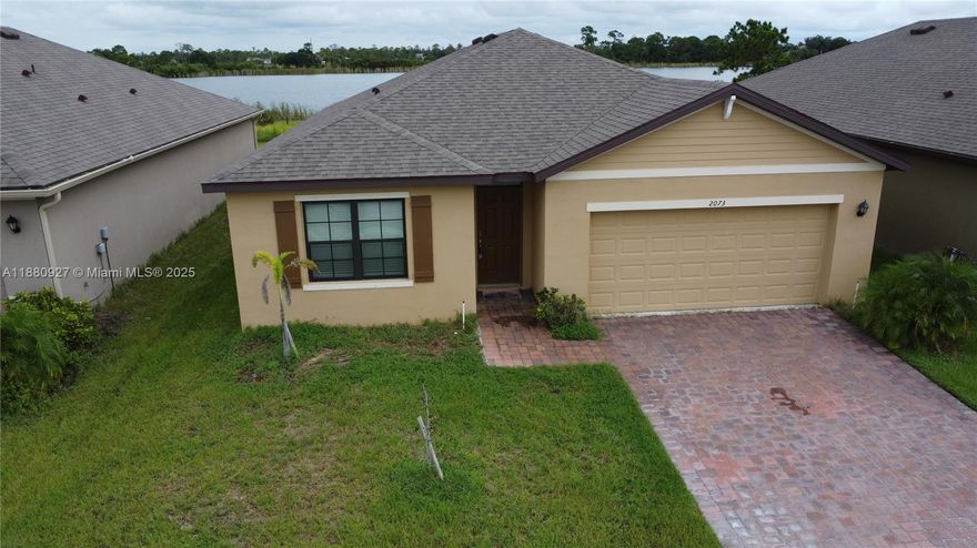 5 min drive to I-95!! Vacant 4 bed 2 bath water front home with 2 car garage built in 2023 with SS appliances, washer and dryer, Cypress Bay is a gated community with a big size pool, close to all amenities, new Publix walking distance, shopping and dinning as well. The beach is just minutes away!!!