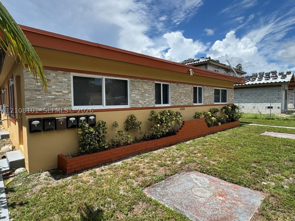 Photo of 6318 Buchanan St #2, Hollywood, FL 33024 (MLS # A12108101)