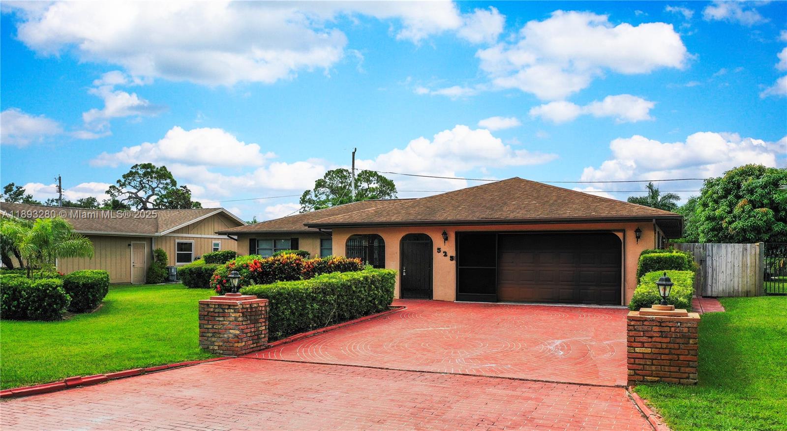 A true must-see! This beautiful 3-bedroom, 2.5-bathroom split floor plan. This home is over 2,100 sqft under air, with a large 2-car garage, custom workbench, and plenty of inside and outside storage. Brand-new remodeled bathrooms, freshly painted, ample closet space, and new vinyl plank flooring throughout. It comes fully equipped with a large utility room (washer/dryer and mop sink), an enclosed screened patio entrance, and an additional enclosed Florida room that could be used as a 4th bedroom, TV room, or office. A huge, fully fenced backyard is perfect for entertaining. The immaculate, landscaped front and rear yards give this home great curb appeal. This home features a great kitchen, living room, and dining room. The bedrooms are all generously sized.