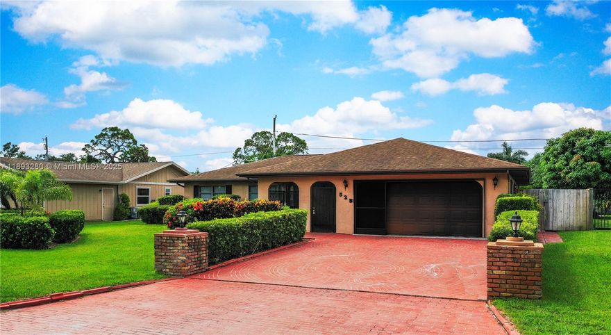 A true must-see! This beautiful 3-bedroom, 2.5-bathroom split floor plan. This home is over 2,100 sqft under air, with a large 2-car garage, custom workbench, and plenty of inside and outside storage. Brand-new remodeled bathrooms, freshly painted, ample closet space, and new vinyl plank flooring throughout. It comes fully equipped with a large utility room (washer/dryer and mop sink), an enclosed screened patio entrance, and an additional enclosed Florida room that could be used as a 4th bedroom, TV room, or office. A huge, fully fenced backyard is perfect for entertaining. The immaculate, landscaped front and rear yards give this home great curb appeal. This home features a great kitchen, living room, and dining room. The bedrooms are all generously sized.