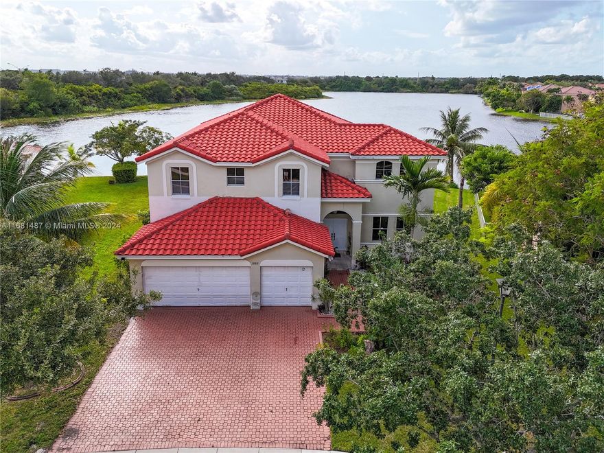Elegant Lakeside Home in Desirable Miramar Neighborhood. An idyllic blend of comfort, quality, and exceptional lake views. This enchanting 2-story residence offers abundant space, comfort, and modern elegance. 24 hrs. security in a gated community with resort style amenities. NEW ROOF 2022. This property offers 5 ample-sized bedrooms and 4 elegantly finished bathrooms. Stainless steel kitchen appliances including washer & dryer. Master bedroom has a large en-suite bathroom. Additional features include a spacious, attached 2-car garage, providing secure and convenient access directly into the home. Enjoy magnificent sunset views while facing the lake, gatherings with family & friends for a fun BBQ on weekends. Short drive to grocery stores, restaurants, shops & top rated schools.