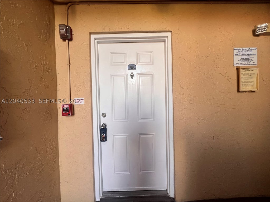 Photo of 5661 Riverside Dr #101B7, Coral Springs, FL 33067 (MLS # A12040533)