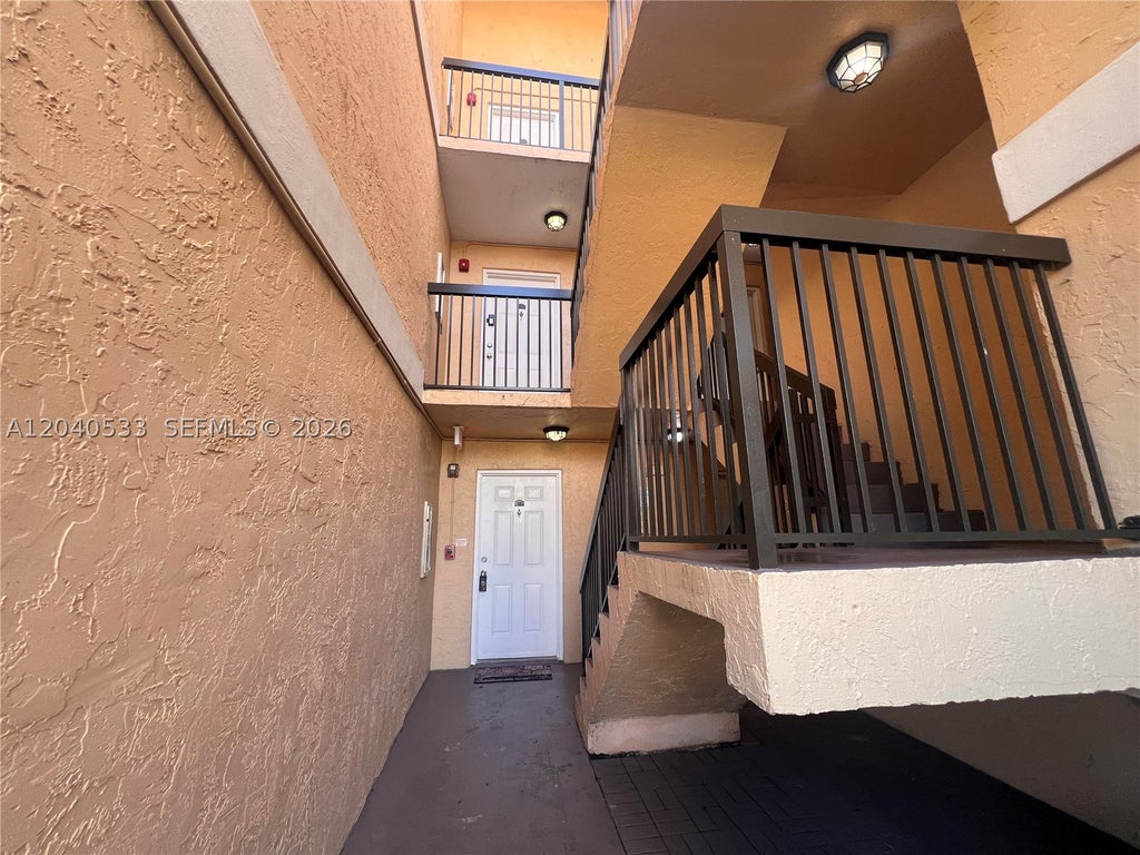 Photo of 5661 Riverside Dr #101B7, Coral Springs, FL 33067 (MLS # A12040533)