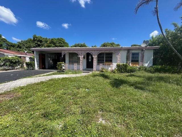PRICED TO SELL, Don’t miss out on this opportunity, The back yard offers privacy and features fruit trees for a natural touch. Property is near I-95, Turnpike access, Sunrise Boulevard, Main Avenues, Shopping Centers, Lauderhill Mall and other stores. This one won't last long !!!