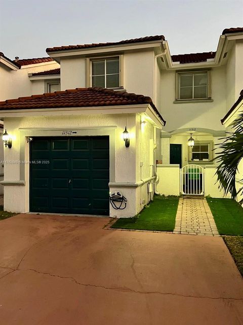 Photo of 11512 NW 48th Ter #., Doral, FL 33178 (MLS # A11762843)