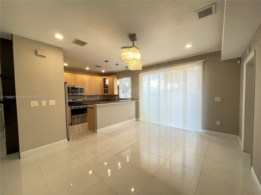 Photo of 6524 Hidden Cove Dr #1-4, Davie, FL 33314 (MLS # A11668219)