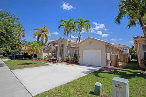 Photo of 13964 N Cypress Cove Cir, Davie, FL 33325 (MLS # A12024256)