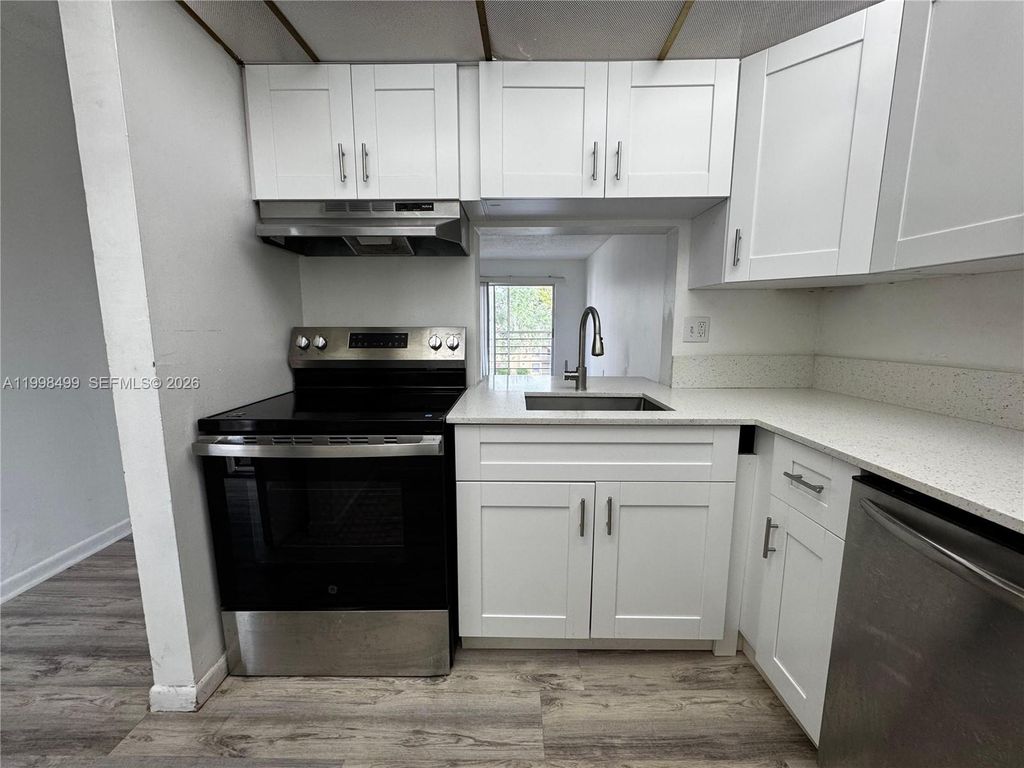 Photo of 2800 NW 56th Ave #D401, Lauderhill, FL 33313 (MLS # A11998499)