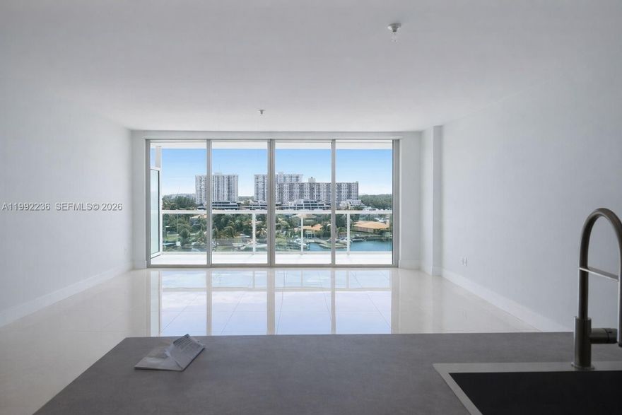 Available June 15. Spectacular, unobstructed water views from this stunning 3-bedroom, 3-bath residence at 400 Sunny Isles. Enjoy wide-angled views overlooking Oleta River State Park from a spacious private balcony. The unit features an upgraded kitchen with Italian cabinetry and stainless steel appliances, along with shades and blackout treatments throughout and custom California closets.

This well-maintained building offers a full-service lifestyle with resort-style amenities including a tennis court, infinity-edge pool, spa, expansive garden-style grounds, private marina, bayfront beach area, and water sports activities.
Prime location close to everything. The unit includes two assigned parking spaces.