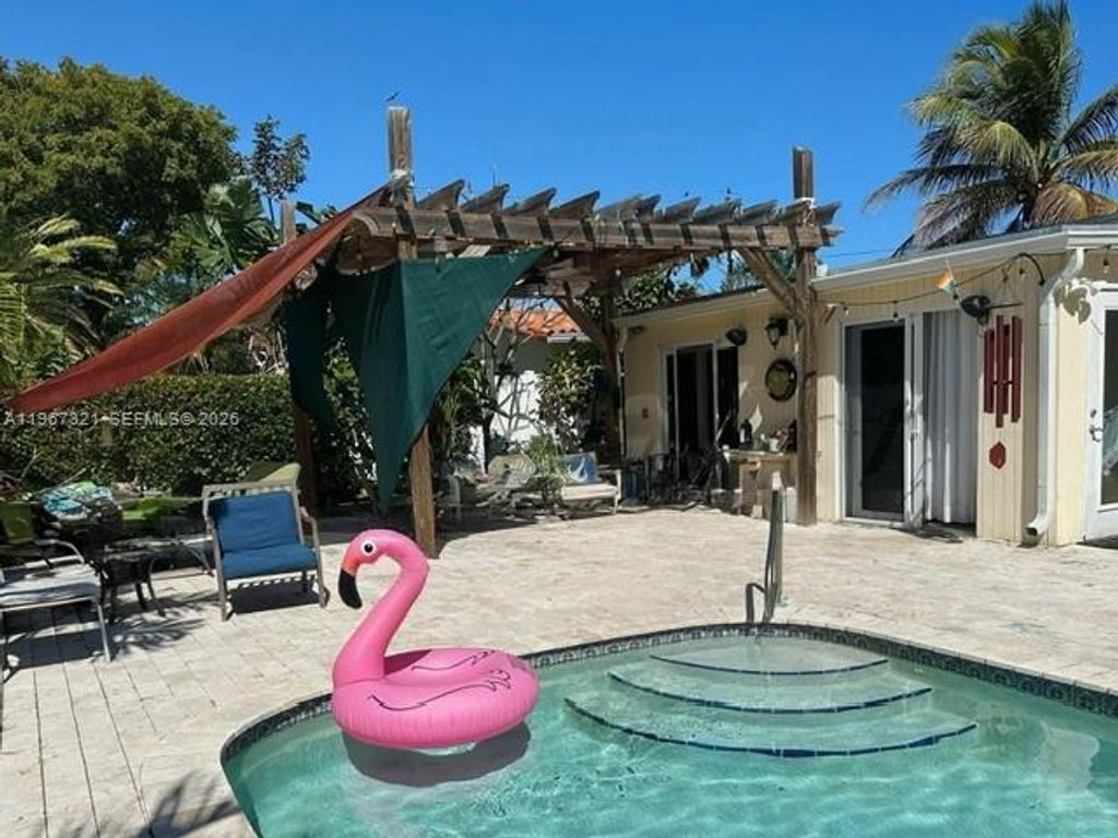 Photo of 4321 NE 15th Ter, Oakland Park, FL 33334 (MLS # A11967321)