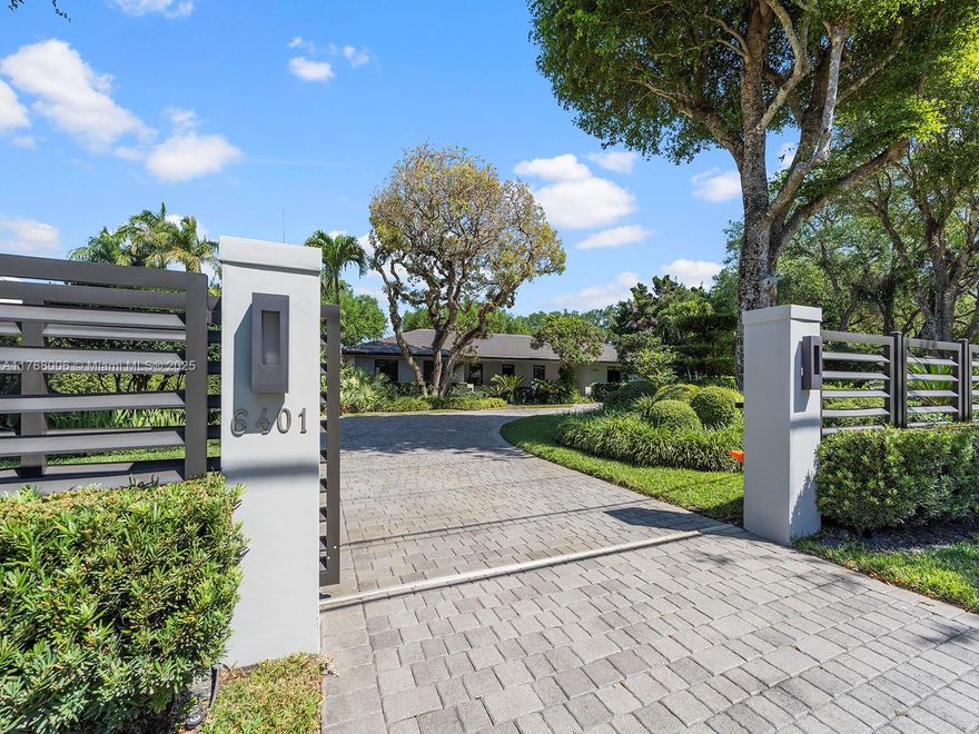 Welcome to 6401 SW 96th St – the crown jewel of North Pinecrest. This gated compound estate with 39,209 SF  offers land value alone at $3.6M. The tastefully remodeled home features 3BR/2BA, a 2-car garage, and an Italian chef’s kitchen with Miele appliances, gas stove, plus wine cooler. Enjoy modern baths, impact glass, and a covered patio with an oversized pool, amazing summer kitchen, pergola, and gym. Surrounded by majestic oaks and rare tropical plants, the lush gardens provide unmatched privacy and serenity—its like living in your own private resort. A truly unique opportunity in one of Miami’s most prestigious neighborhoods. A very unique property in this special area of North Pinecrest. "A MUST SEE PROPERTY IF YOU ARE LOOKING FOR A SPECIAL HOME"