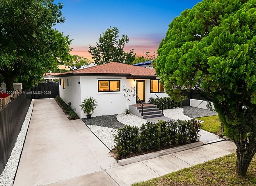 Modern 3-bed, 3-bath home with a detached cottage meticulously renovated. The cottage includes a full bathroom and kitchenette. Upgrades include new plumbing, electrical systems, impact windows, doors, and a  2020 roof. The bright, open kitchen features quartz countertops and stainless steel appliances. Elegant Italian tile floors throghout. Primary bedroom offers an en-suite bath and a generous walk-in closet. The cottage matches the home's aesthetic and works as a home office, gym, guest house, or rental. A fenced garden offers space to add a pool. Just ten minutes from Brickell, Coral Gables, and The Grove, with easy access to highways, public transportation, and the airport. Shenandoah is increasingly popular among professionals and families seeking space and value near the urban core.