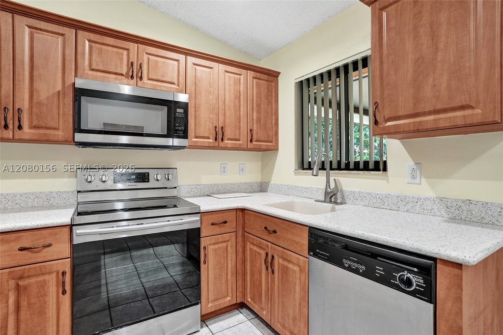 Photo of 5312 NW 92nd Ave, Sunrise, FL 33351 (MLS # A12080156)