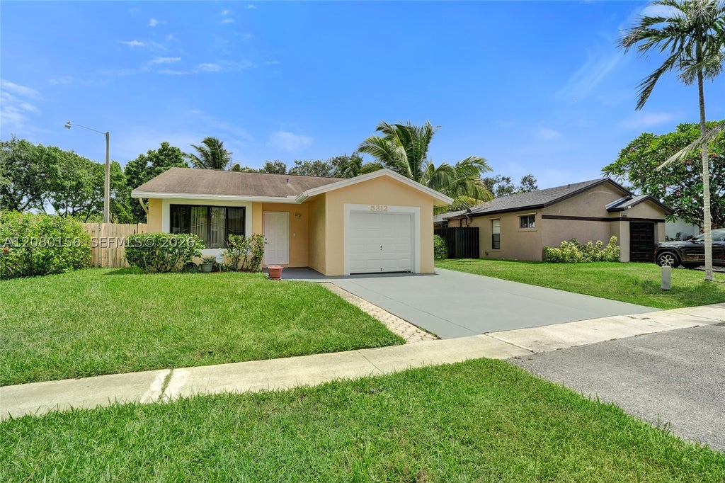 Photo of 5312 NW 92nd Ave, Sunrise, FL 33351 (MLS # A12080156)