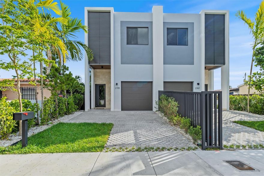 Modern new construction townhome offering luxury design. This 4-bedroom, 4.5-bath residence features 2,671 SF under A/C and a bright open floor plan with porcelain tile floors, recessed lighting, and a sleek kitchen with custom cabinetry, quartz countertops, stainless steel appliances, and a large island. Sliding glass doors lead to a private patio with a plunge pool, perfect for indoor-outdoor living.
The spacious primary suite includes dual sinks, two walk-in closets, and a spa-style bathroom with a soaking tub and glass-enclosed shower. Additional features include impact windows and doors, modern finishes throughout, a garage, and a laundry room with a utility sink.
A contemporary Miami retreat designed for both comfort and style.