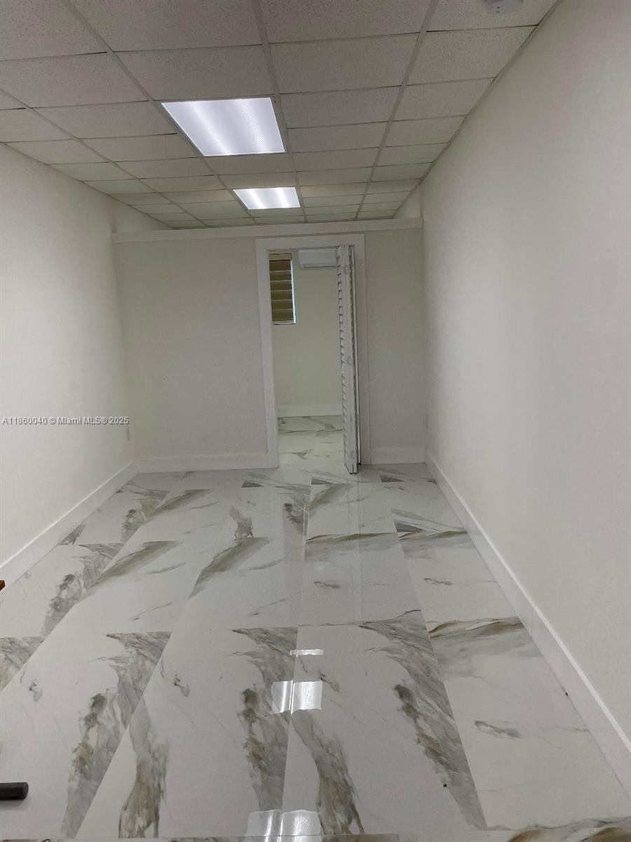 Approx 264 SQFT private office space unit is 30 feet long by 8 feet 10 inches wide. Electric and water included in rent. Also one assigned parking space. Great Location clean renovated office/Retail Bldg