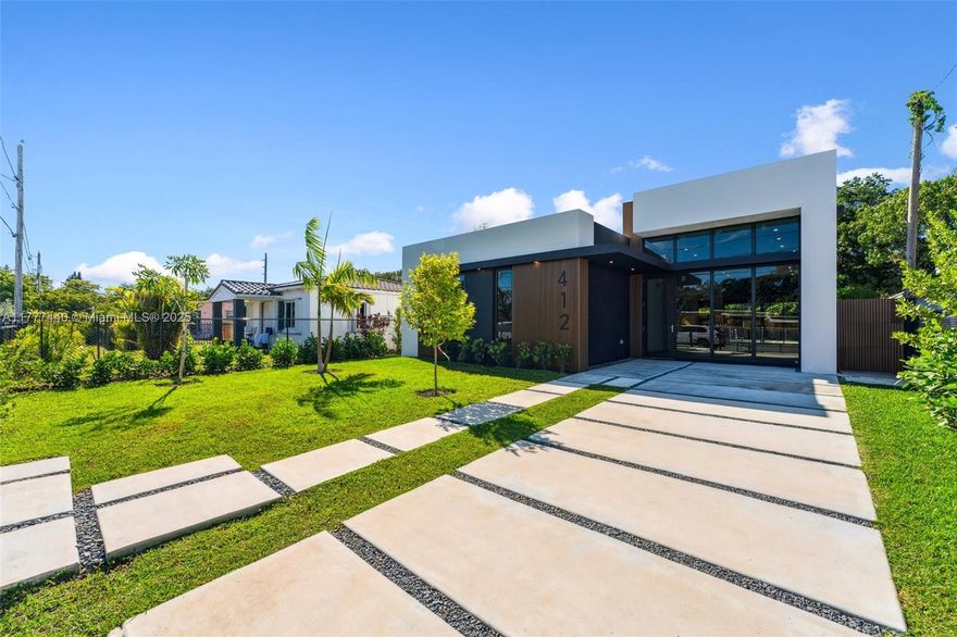 MOTIVATED SELLER! Stunning NEW CONSTRUCTION home, Ideal for INVESTORS SHORT TERM RENTALS. Designed with modern minimalist and exceptional comfort in mind. Experience luxury in this 5-bedroom, 3.5-bath home featuring a spacious master suite with walk-in closet, ensuite bath, and direct pool access. The 40-ft open-concept living area with soaring 13-ft ceilings blending seamlessly indoor-outdoor living. Enjoy a gourmet kitchen with a waterfall island, new appliances, and floor-to-ceiling cabinets. A fully equipped laundry area adds to the home's convenience. A covered terrace with BBQ area overlooks a stunning 10' x 30' pool, perfect for entertaining. Located in one of Miami’s vibrant fastest-growing development areas, just mins from the Design District, Midtown, Miami Beach.