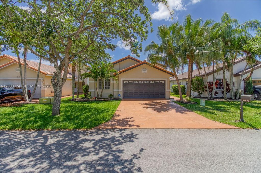 Photo of 17676 SW 6th Ct, Pembroke Pines, FL 33029 (MLS # A12000974)
