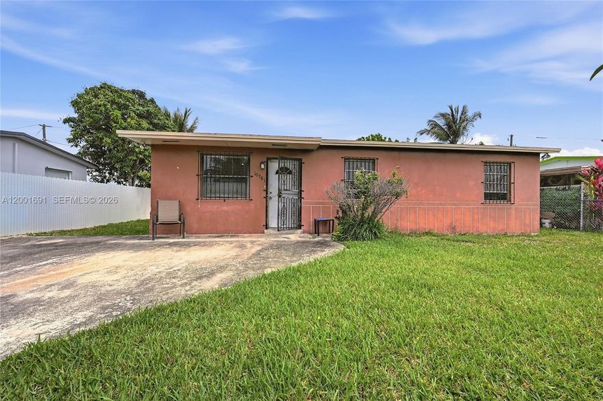 Wonderful location for this 3/1 home plus laundry room. Home is in need of  some TLC. Large fenced lot with tons of potential. Plenty of parking and No HOA.