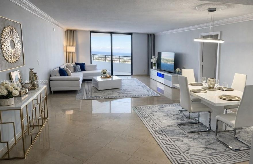Rare high-floor corner 3BD/2BA at Olympus with panoramic Intracoastal, ocean, and skyline views plus a massive private terrace. Approx. 1,560 SF, split-bedroom layout, updated kitchen, and move-in ready condition. Investor-friendly with immediate rentals allowed, 6-month minimum, up to 2 times per year. Resort-style amenities include marina, dock access, pool, fitness center, tennis, sauna, and 24-hour security. Opportunities like this are limited at Olympus. Call today for pricing, rental details, and private showing availability.